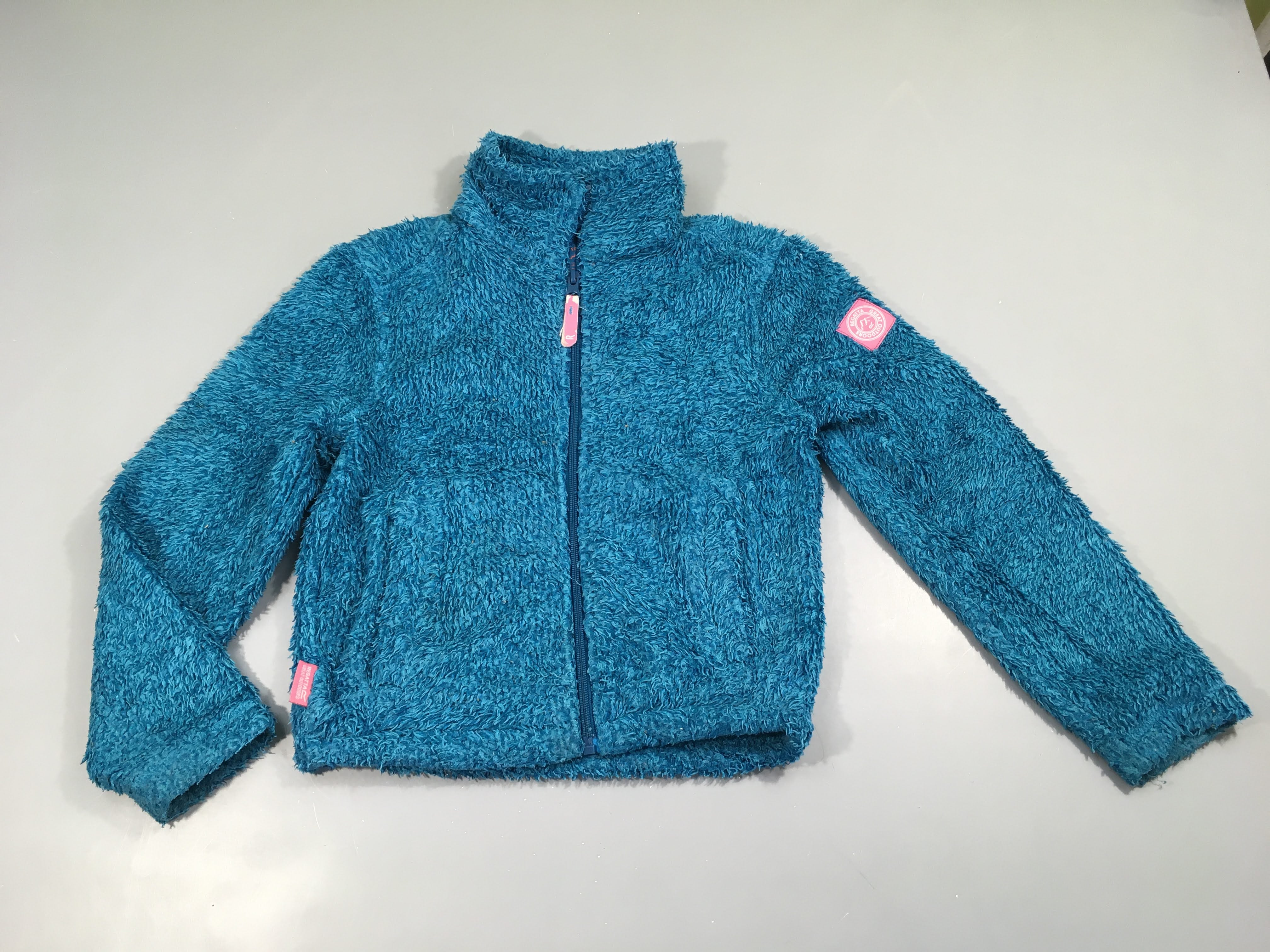 Gilet peluche turquoise bouloché
