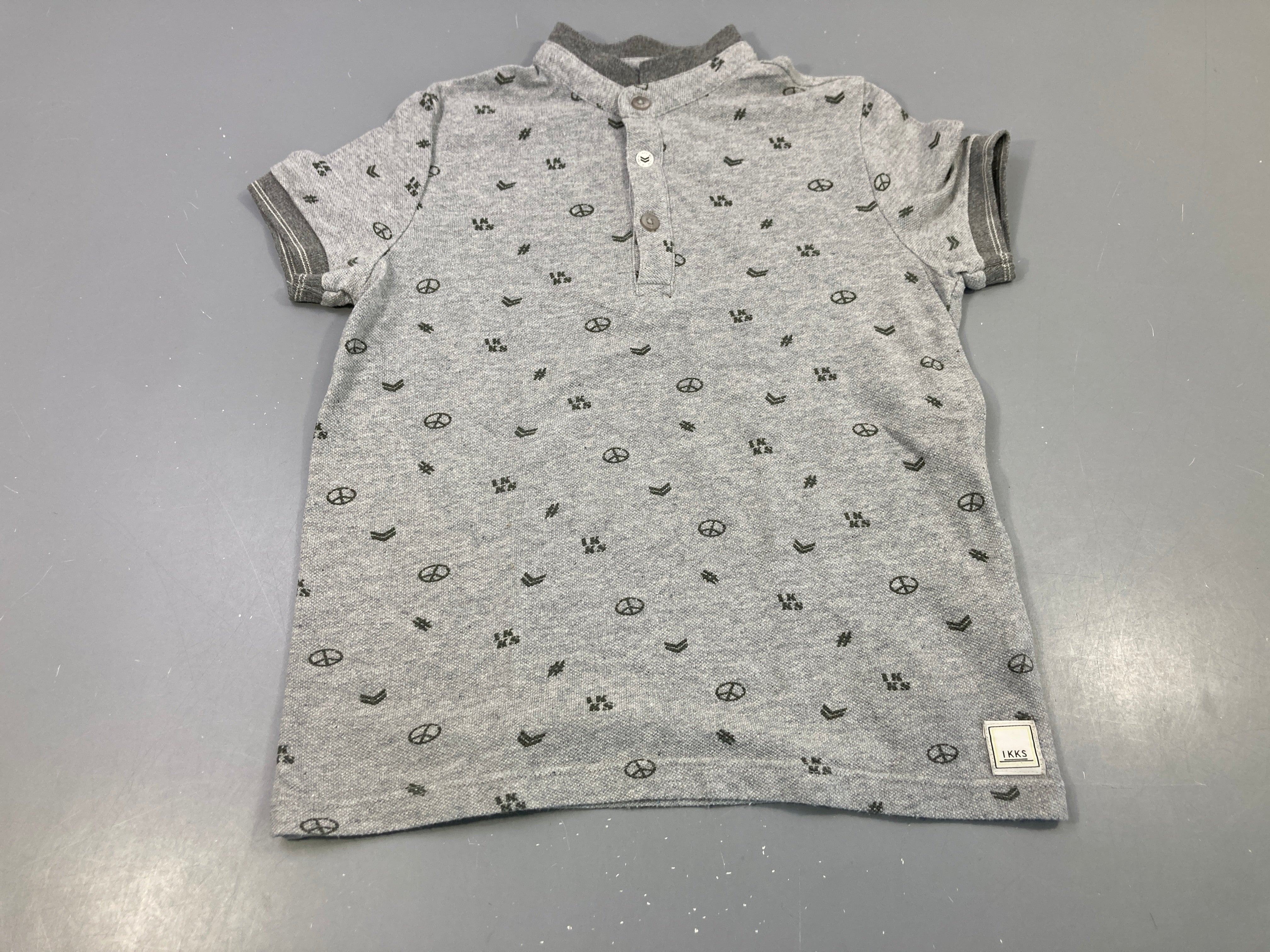Polo m.c gris motifs