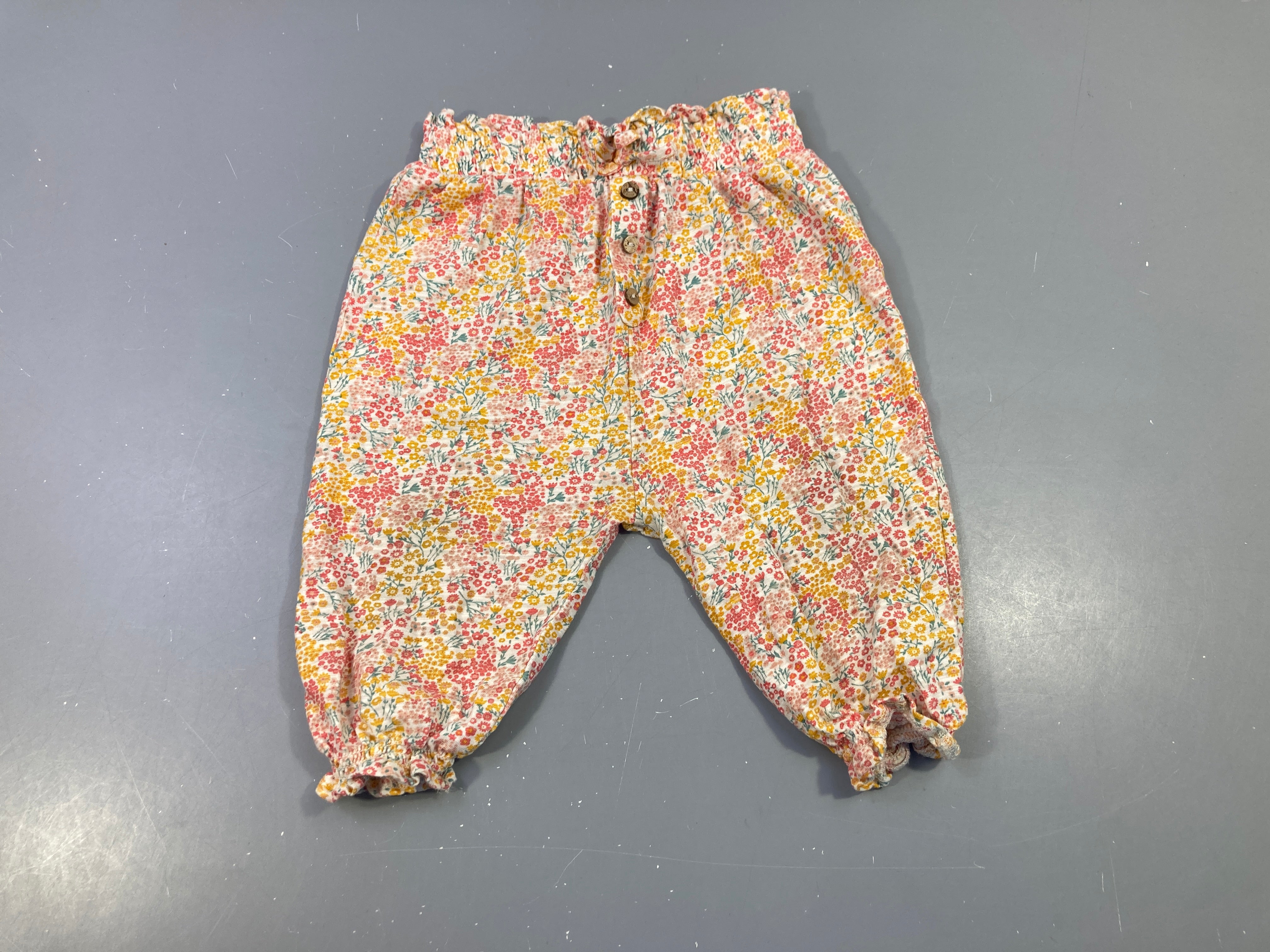 Pantalon jersey fleuri jaunes-rose s.moks tailles et chevilles