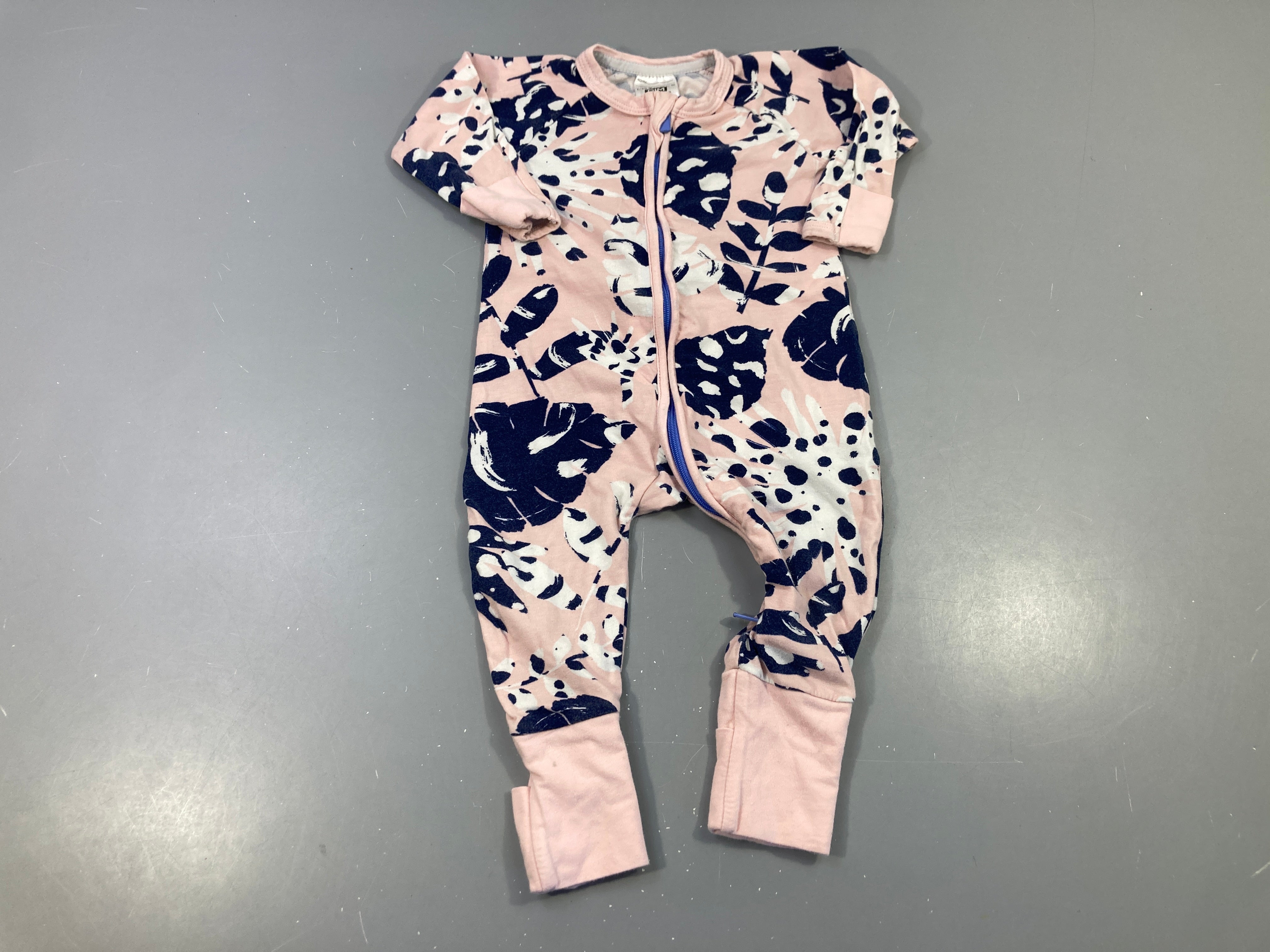 Combinaison zippée rose clair feuillage bleu-blanc Dim