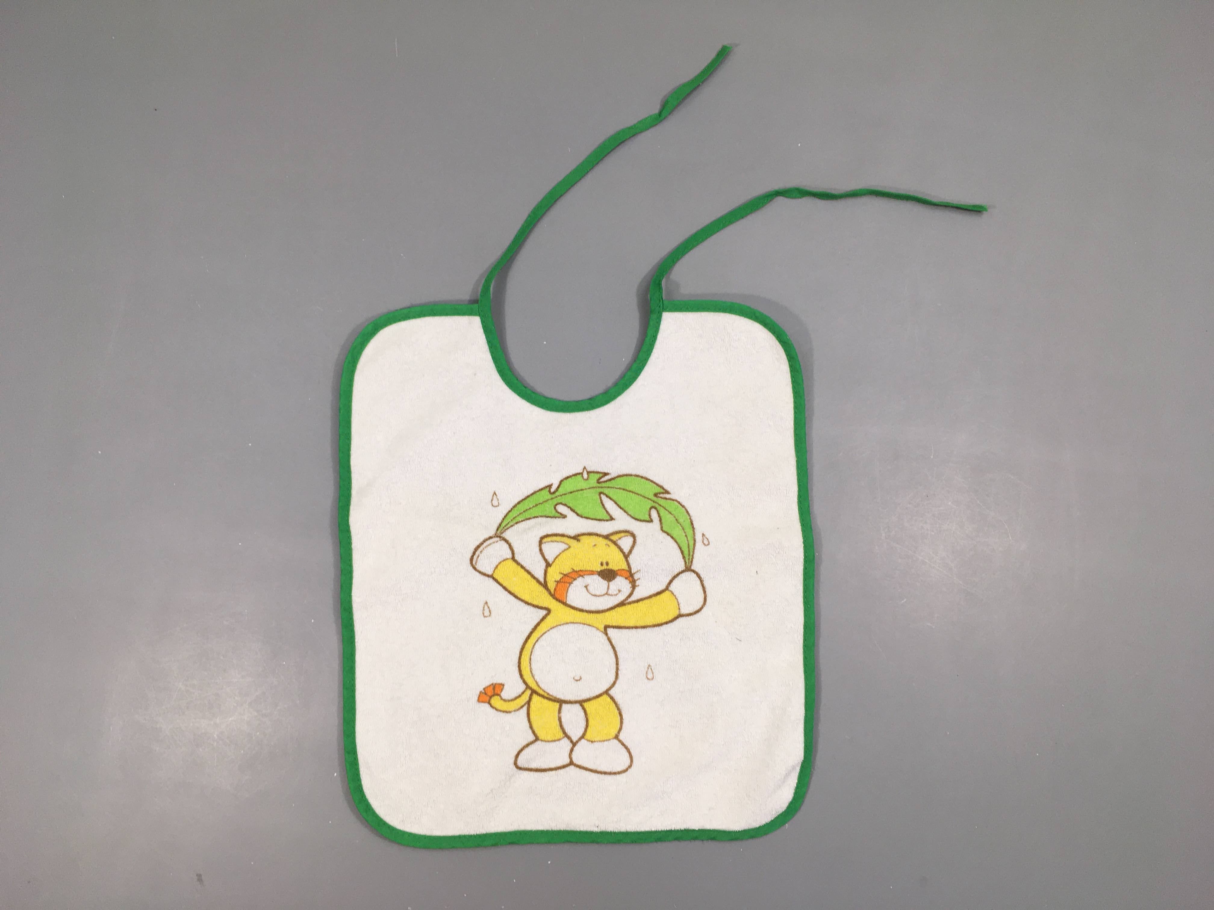 Bavoir blanc Félin jaune