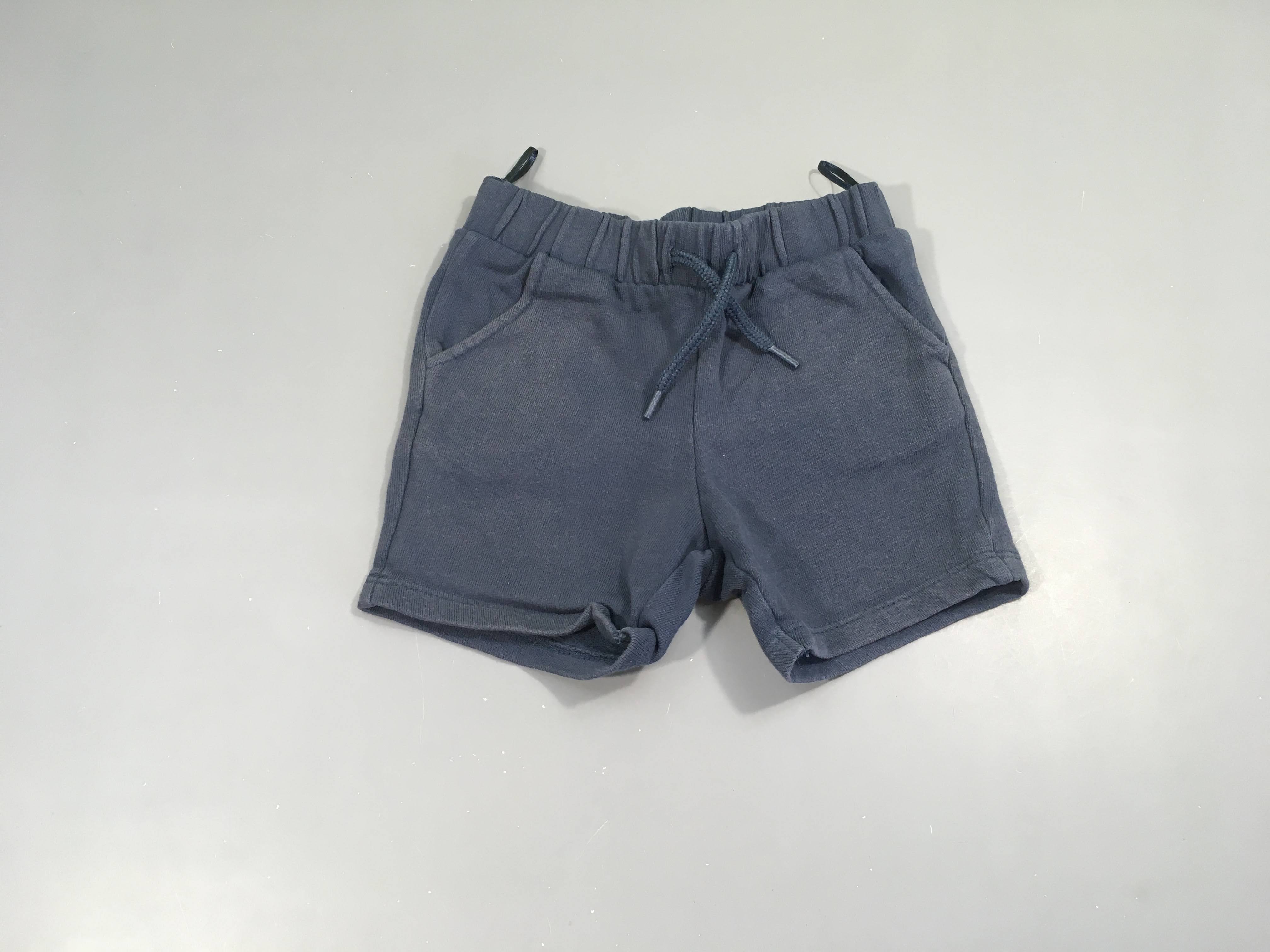 Short molleton bleu légèrement décoloré