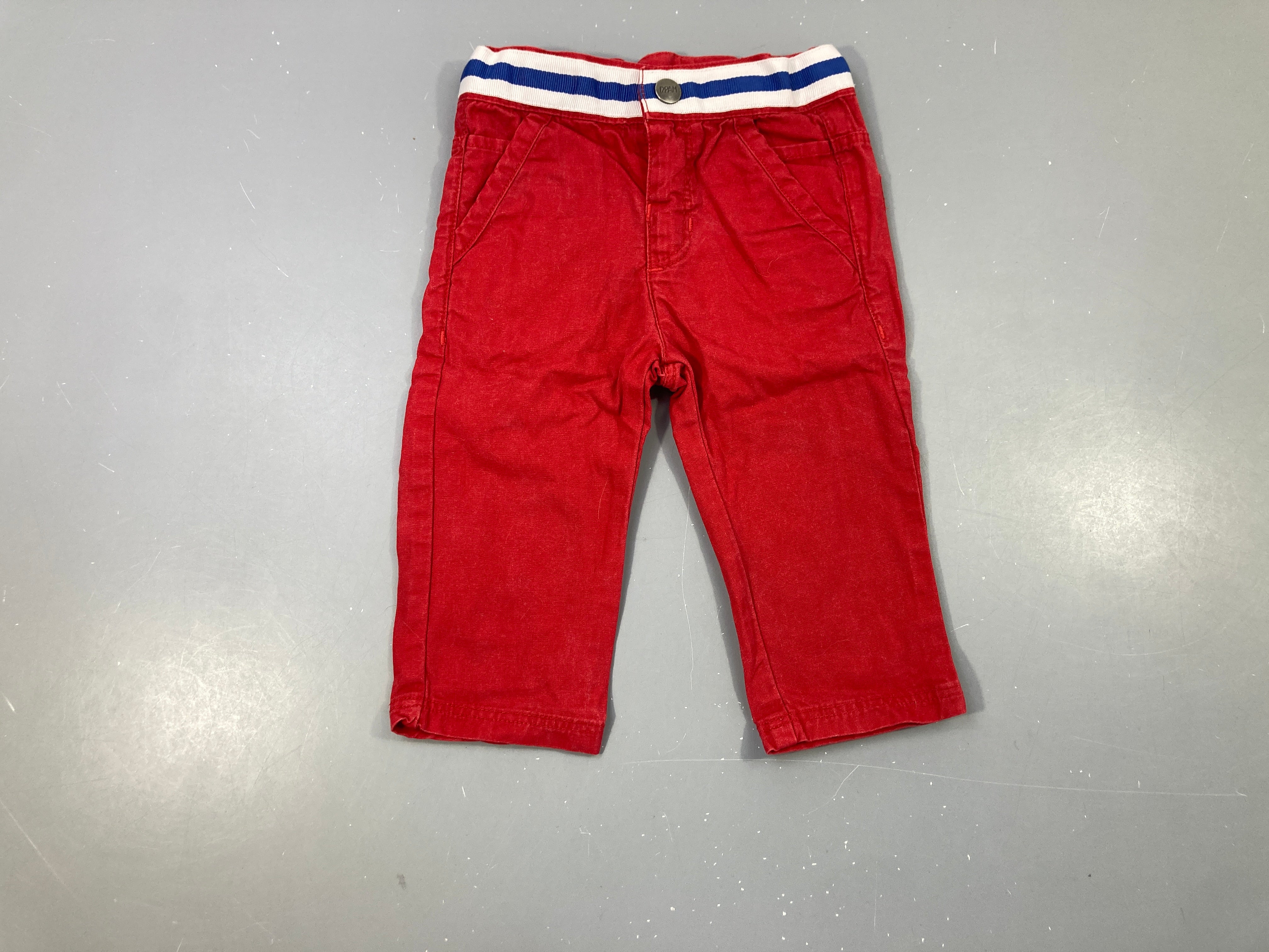 Pantalon rouge taille rayé blanc-bleu