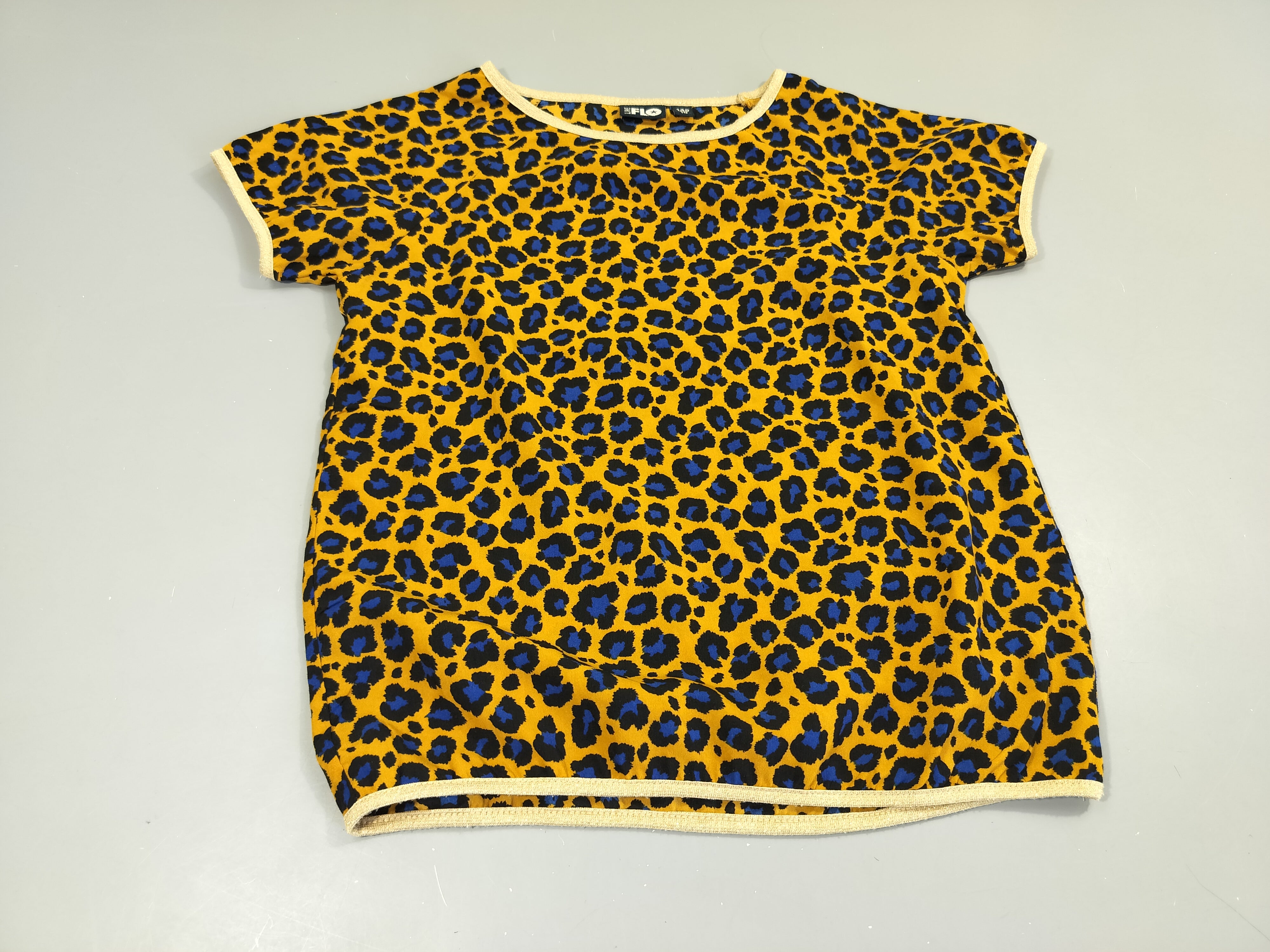 Blouse m.c jaune moutarde tacheté bleu-noir