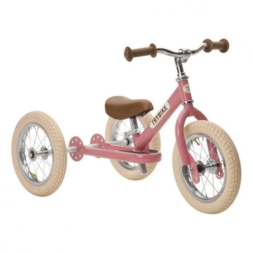 Draisienne Trybike rose, draisienne évolutive, marque de rouille au niveau des roues et du cadre, moins cher chez Petit Kiwi