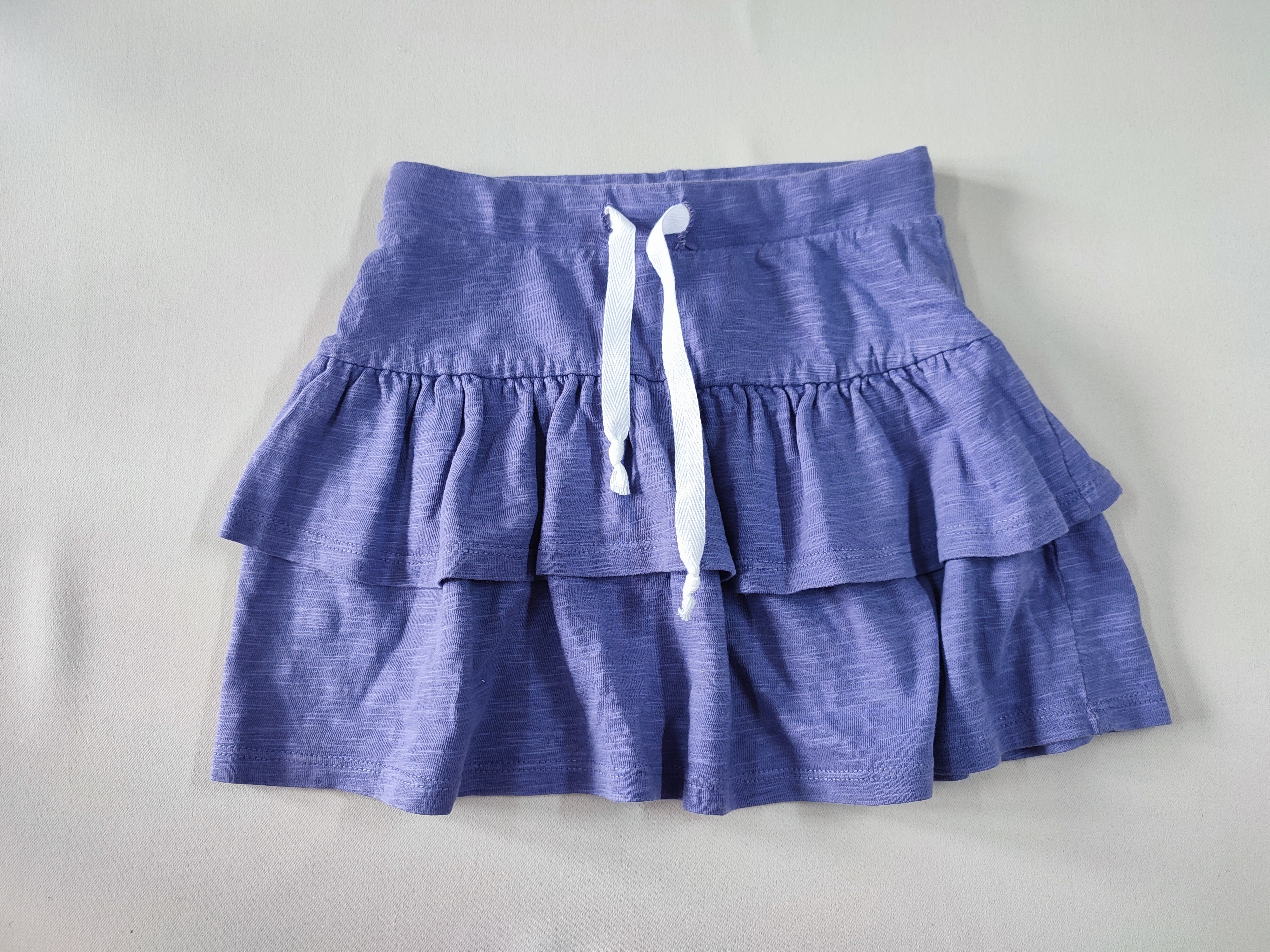 Jupe à volants mauve cordon blanc