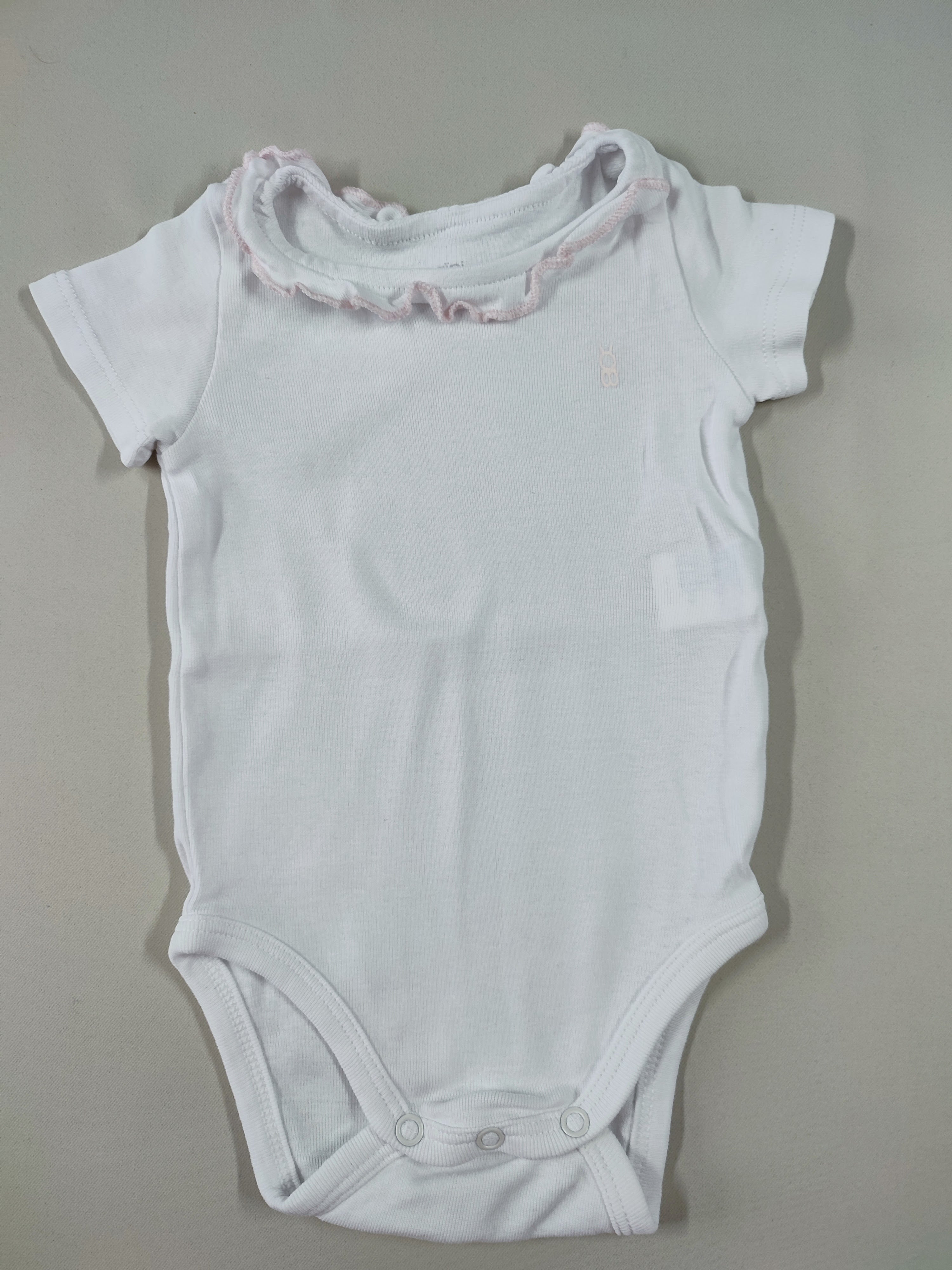Body m.c blanc col froufrou lisière rose