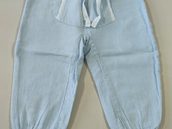 Pantalon 55% lin bleu clair taille et chevilles élastiques poche sur le devant