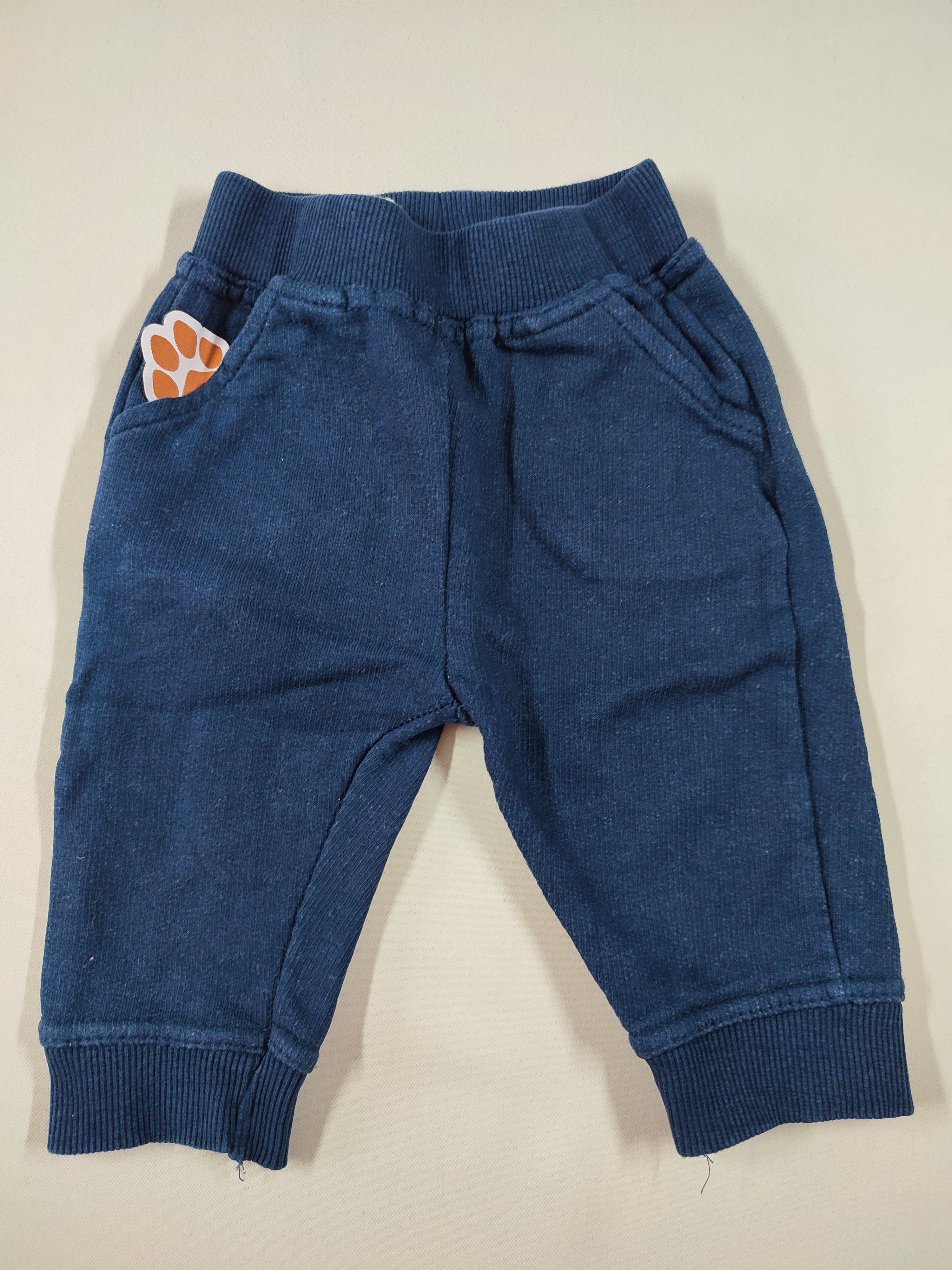 Pantalon molleton bleu marine empreinte patte de chien poche