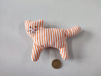 Hochet textile chat ligné blanc/orange