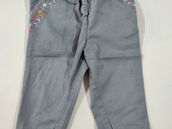 Pantalon gris texturé à revers broderies aux poches