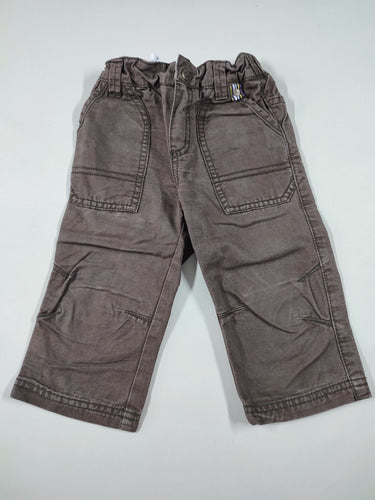 Pantalon brun "54" sur la poche arrière, moins cher chez Petit Kiwi