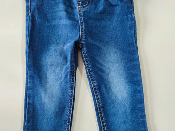 Jeans bleu effet usé aux genoux