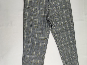Pantalon style tweed à carreaux blanc/noir/doré