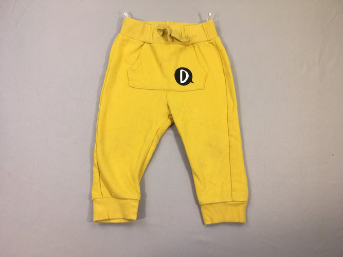 Pantalon molleton jaune D poche avant, un peu taché, moins cher chez Petit Kiwi
