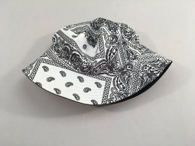 Chapeau réversible noir/blanc motifs noirs, moins cher chez Petit Kiwi