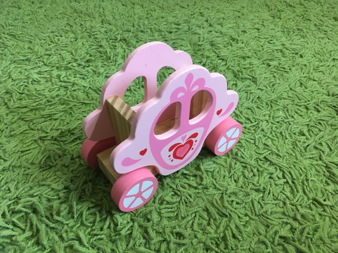 Carosse en bois rose, moins cher chez Petit Kiwi