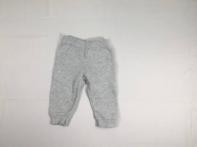 Pantalon de training gris chiné, légèrement bouloché, moins cher chez Petit Kiwi