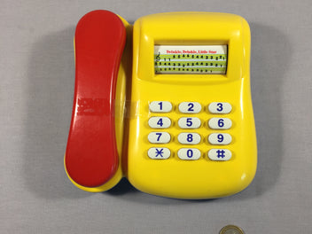 Téléphone - piano jaune avec cornet rouge
