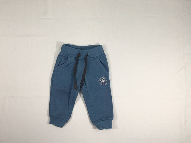 Pantalon de training bleu 141, légèrement bouloché, moins cher chez Petit Kiwi