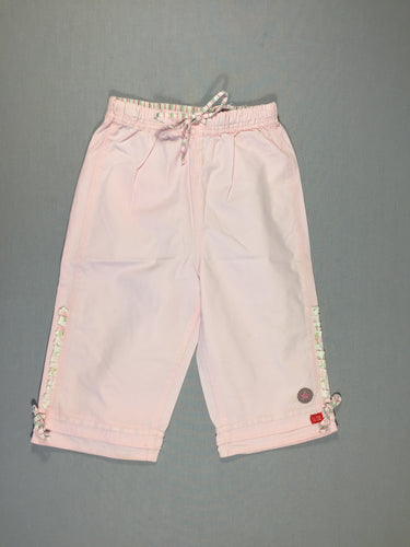 Pantalon rose clair en toile - cordon ligné taille et chevilles - volant vertical dans le bas, moins cher chez Petit Kiwi