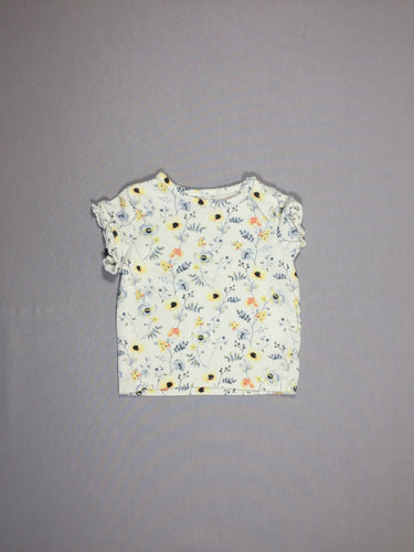 T-shirt m.c blanc fleurs bleues et jaunes - volant aux manches, moins cher chez Petit Kiwi