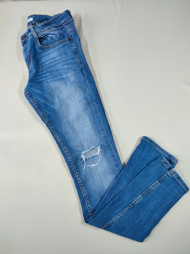 Jeans skinny effet eraillé troué au genou, moins cher chez Petit Kiwi