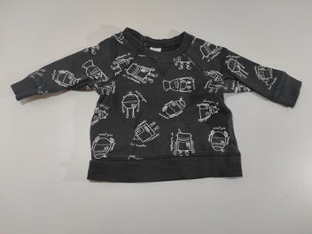 Pull noir à motifs robots blancs