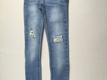 Jeans effet déchiré sequins aux genoux