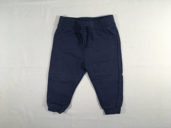 Pantalon molleton bleu marine, légèrement bouloché