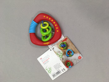 NEUF hochet rouge anneaux musicaux