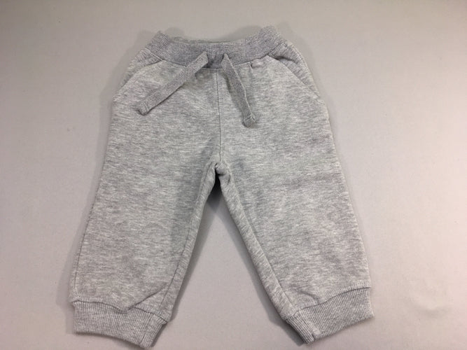 Pantalon molleton gris chiné, un peu bouloché, moins cher chez Petit Kiwi